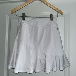 White Target tennis skirt with built-in shorts.